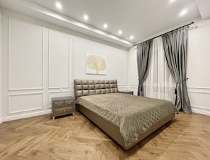 City Apartment | 3 bedrooms, premium bedding, iron/ironing board, free WiFi