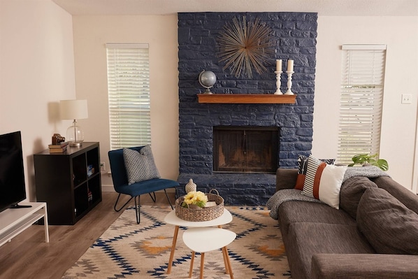 TV, fireplace, books, stereo