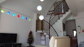 Deluxe Apartment | Living room | 32-inch flat-screen TV with digital channels, TV