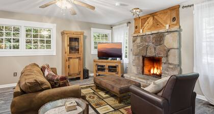 Secluded 1 BR Cabin w/ Hot Tub, Wi-Fi, Pool Access, Free Tickets