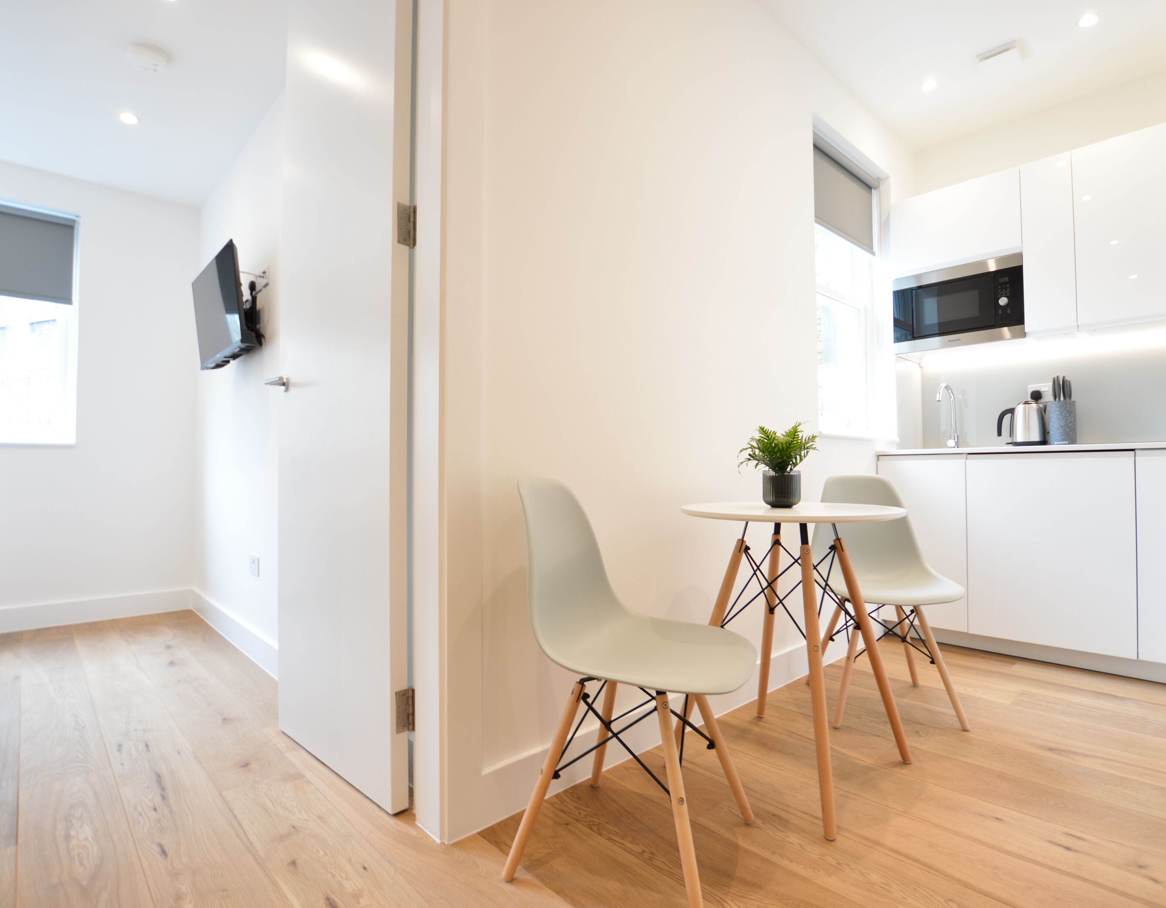 Economy One Bedroom Apartment | Living area | Flat-screen TV, heated floors
