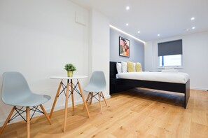 Deluxe Studio Apartment | Living area | Flat-screen TV, heated floors -  StayPrime Marylebone Serviced Apartments (London)