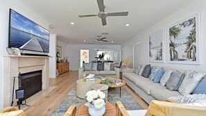 Smart TV, fireplace - Reflections at Sunset Beach - a stunning 5-bedroom, absolute waterfront property at Soldiers Point (Soldiers Point)