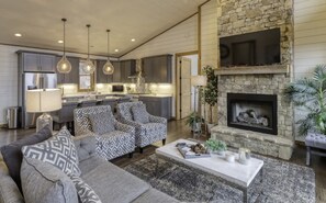 TV, fireplace, offices - Luxury Blue Ridge Cabin • Pool, Hot Tub, Views (Mineral Bluff)