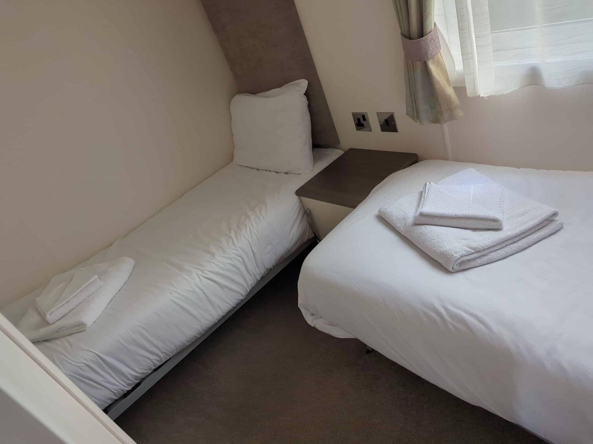 2 多间卧室、免费 WiFi、床单