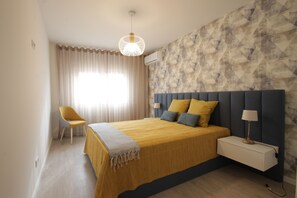 1 غرفة نوم وخزنة داخل الغرفة و�مكواة/لوح كي وواي فاي