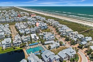 A coastal residential area with houses, a beach, and a swimming pool. - Tlc 261 Be (Port Aransas)