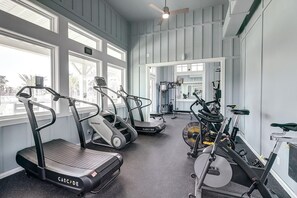Work out in style with our fully equipped gym featuring treadmills, a stationary bike, and a rowing machine.