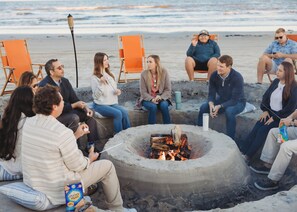 Guests can gather around the fire pit for a warm and cozy evening.