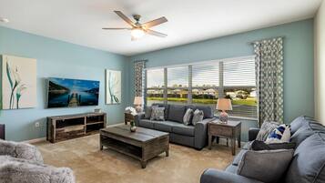 Family House, 6 Bedrooms | Living area | 55-inch Smart TV with digital channels, foosball, streaming services