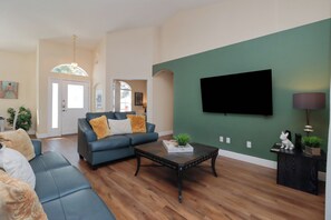 55-inch Smart TV with digital channels, streaming services