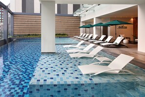 Outdoor pool, open 6:00 AM to 8:00 PM, pool umbrellas, pool loungers - Holiday Inn Cebu City by IHG (Cebu City)