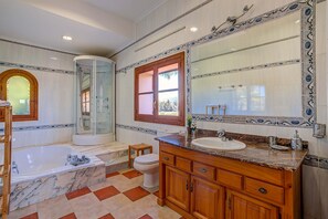 Bathtub, hair dryer, towels