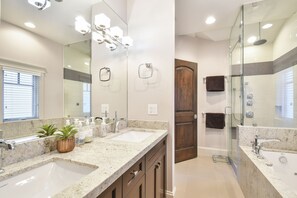 Combined shower/bathtub, hair dryer, towels, soap