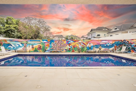 Outdoor pool, open 9:00 AM to 6:00 PM, pool umbrellas, sun loungers