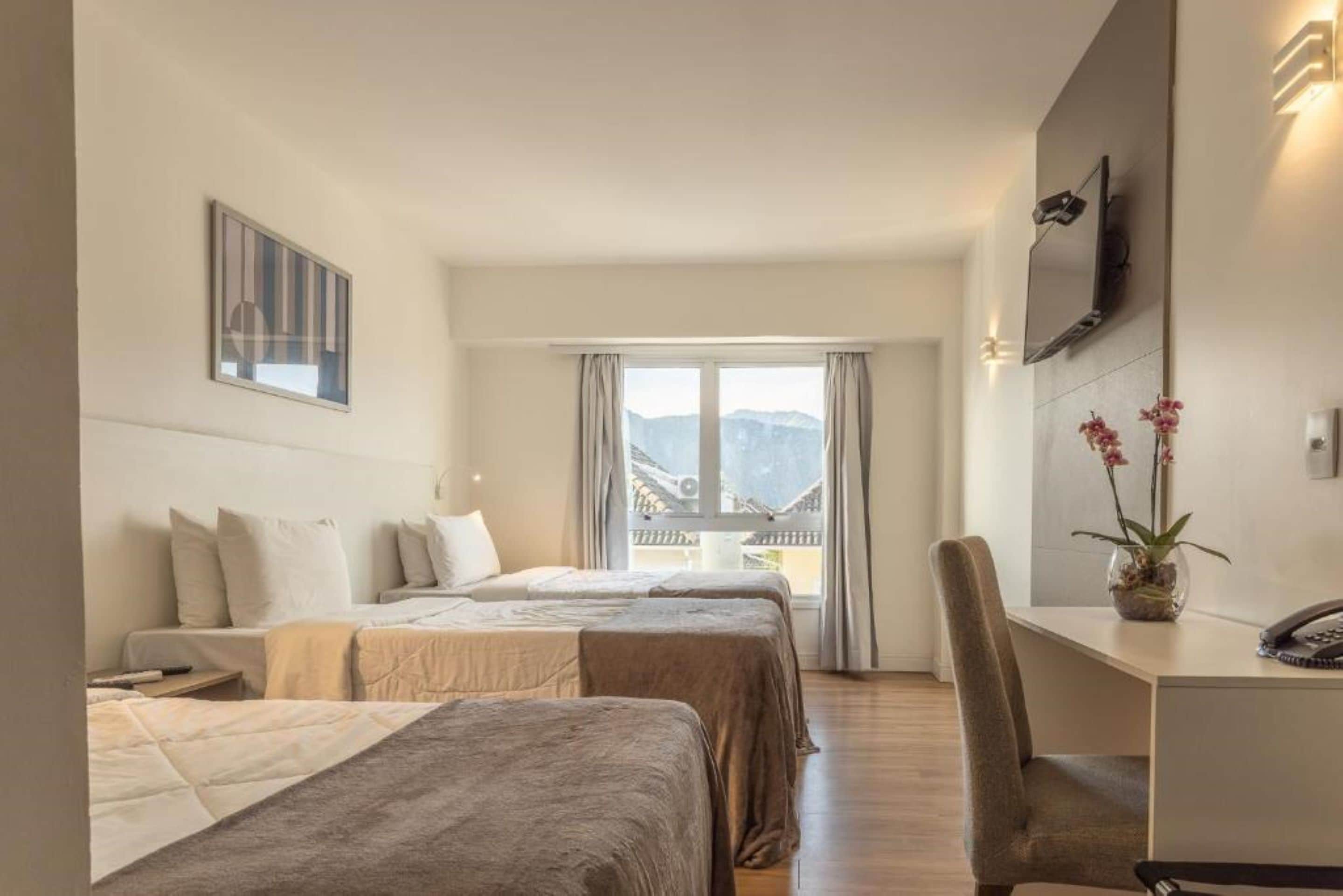 standard triple room, 3 single beds | 1 bedroom, minibar, in-room safe, desk