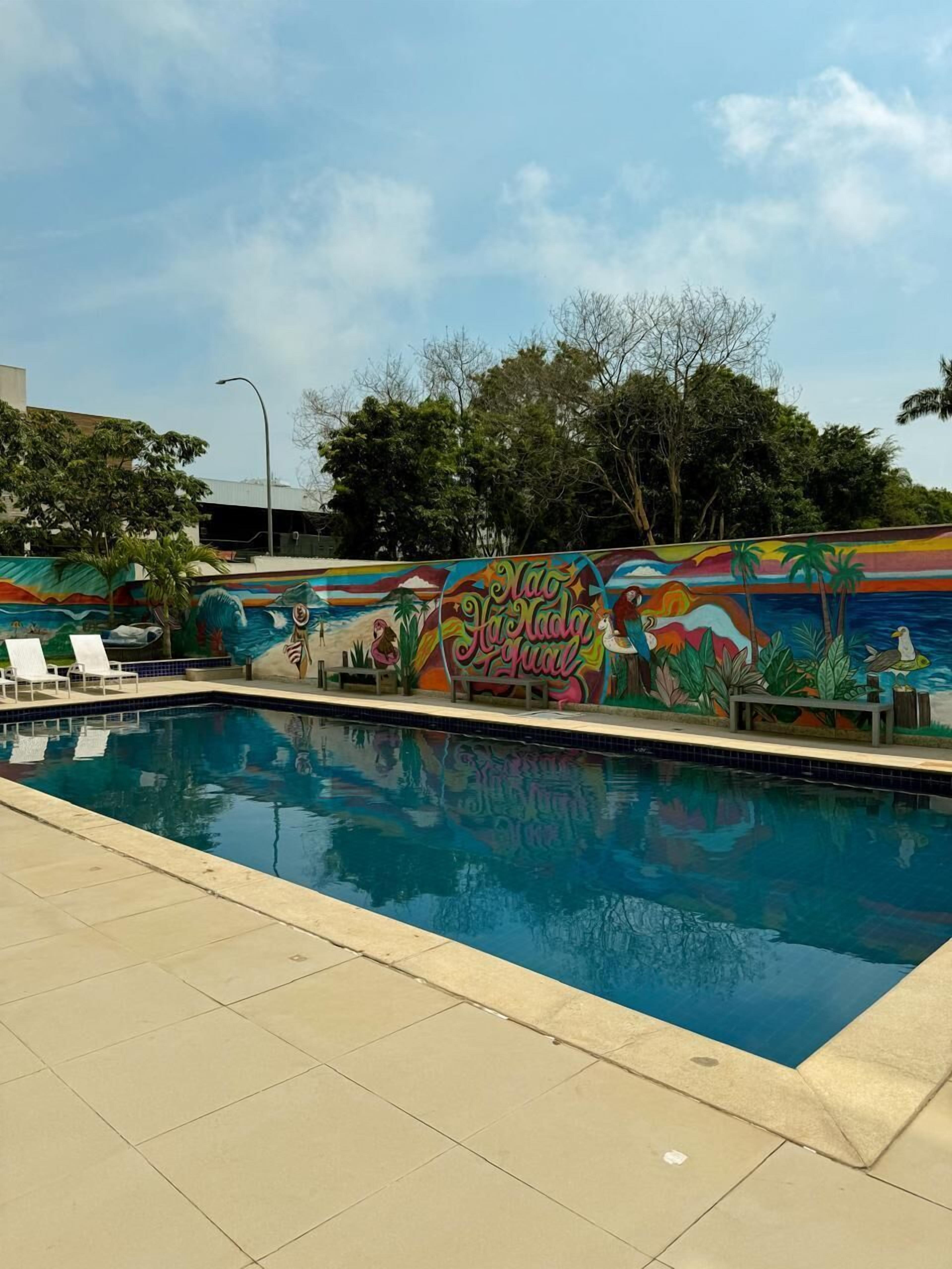 outdoor pool, open 9:00 am to 6:00 pm, pool umbrellas, pool loungers