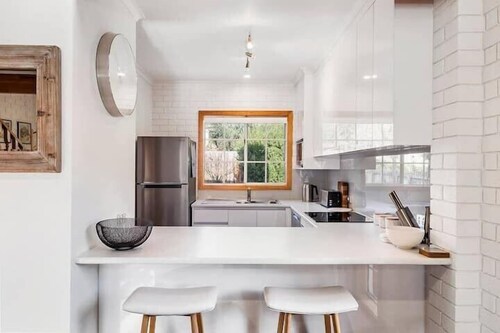 Cozy 2-Bed Villa in Prime Location with parking.