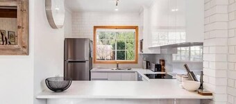 Cozy 2-Bed Villa in Prime Location with parking.