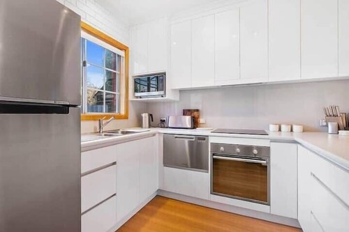 Cozy 2-Bed Villa in Prime Location with parking