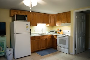 House, 1 Queen Bed with Sofa bed, Patio, Garden View | Private kitchen | Coffee/tea maker