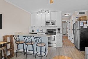 Fridge, microwave, oven, stovetop - Oceanfront 1st Floor Condo!! Community Pool & Fishing Pier! In the Heart of IOP! *Unit 115* (Isle Of Palms)