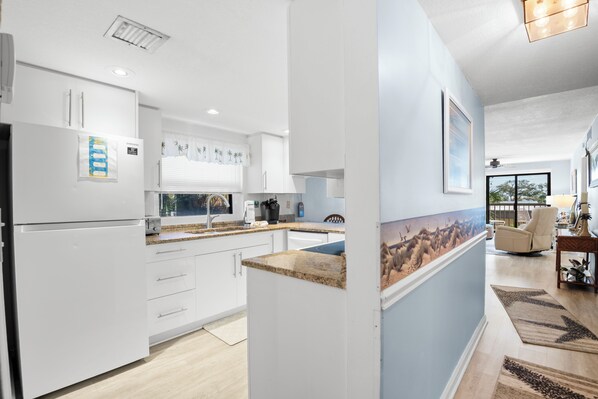 Fridge, microwave, oven, stovetop - 🌅 Unit 105 at Gulf Gate – Spacious Dual-View Condo for Up to 6 Guests (St Pete Beach)