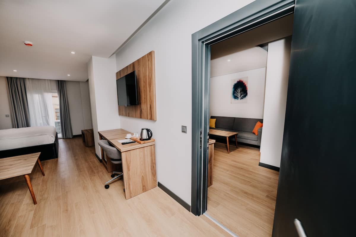 Junior Suite | 1 bedroom, in-room safe, iron/ironing board, free cots/infant beds