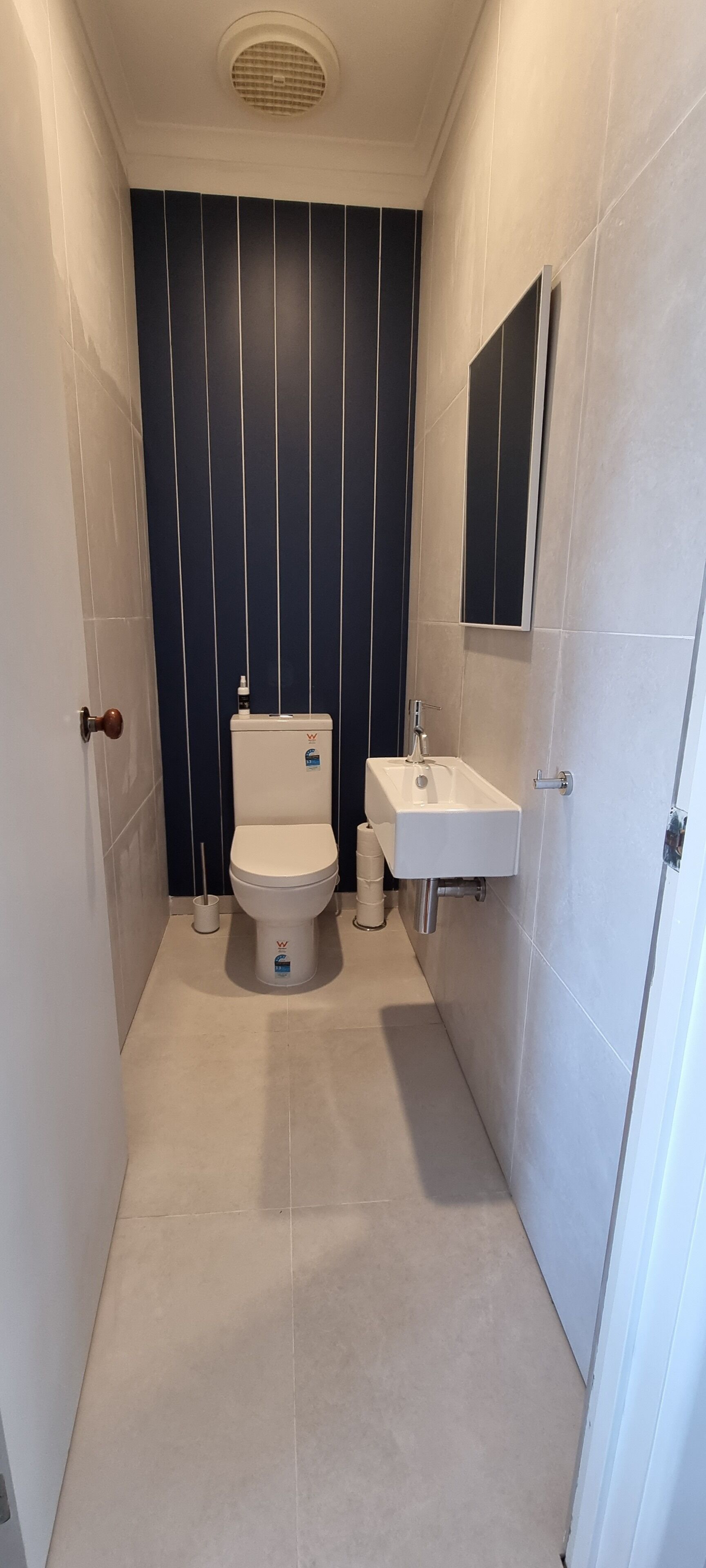 Shower, hair dryer, soap, toilet paper