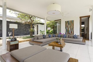 4BR Luxury Villa | Lap & Children's Pool, Events Ready, Concierge, Chef on Request | Living area | 53-inch Smart TV with cable channels, TV, DVD player - Villa Kavya (Canggu)
