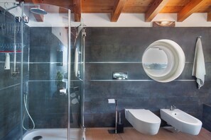 Bathtub, hair dryer, towels