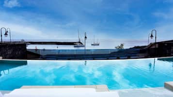 Outdoor pool, pool umbrellas, pool loungers