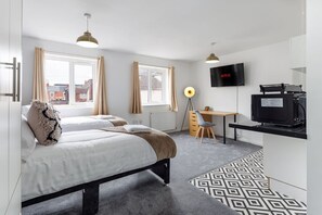 Desk, iron/ironing board, travel crib, WiFi