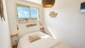 1 dormitorio, tabla de planchar con plancha, wifi gratis y ropa de cama
