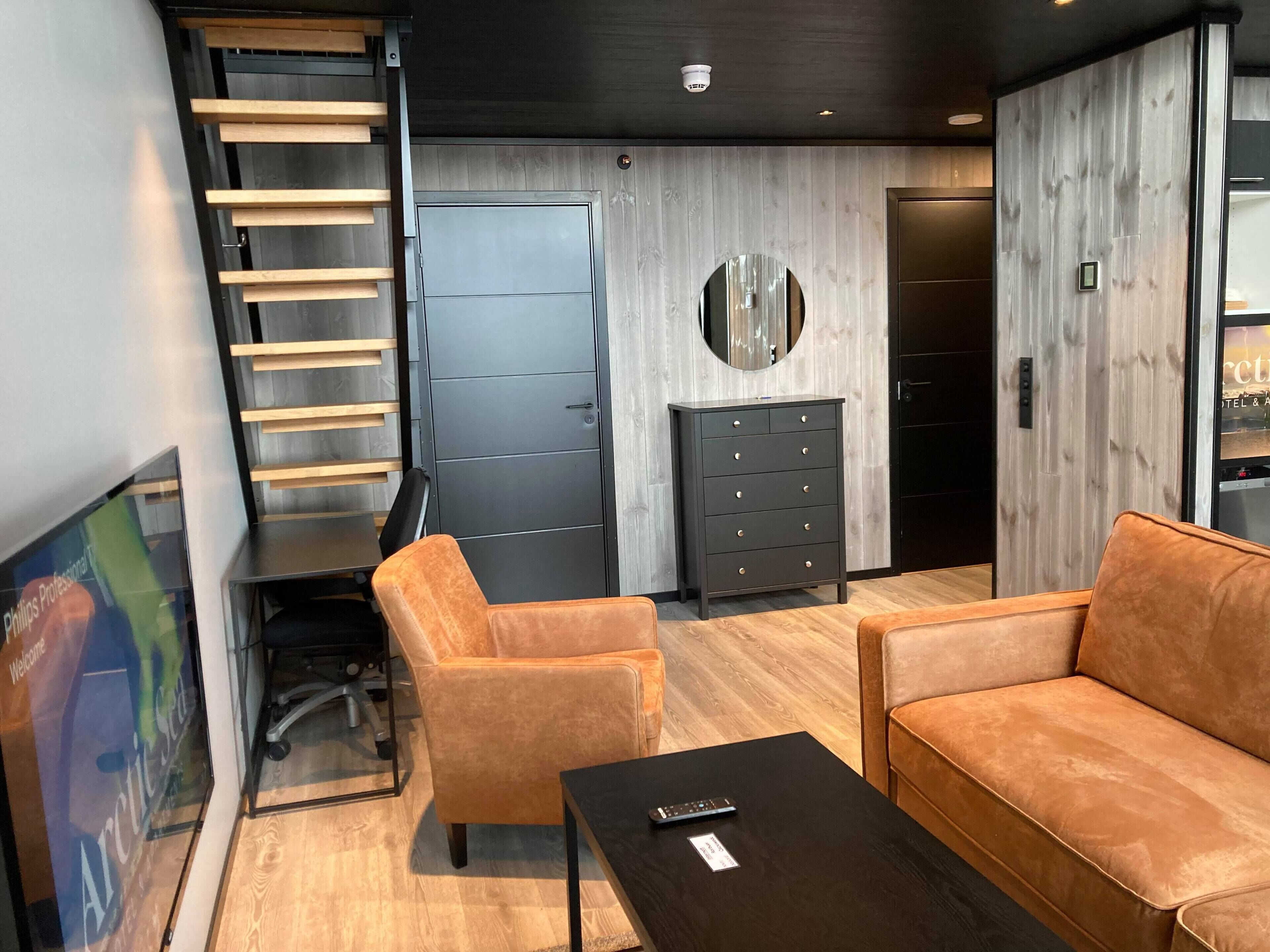 rorbue deluxe | living area | 43-inch smart tv with satellite channels, tv