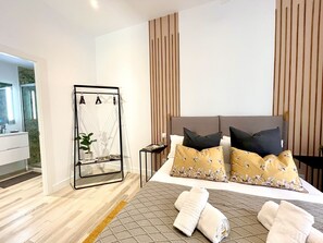 2 slaapkamers, een strijkplank/strijkijzer, gratis wifi