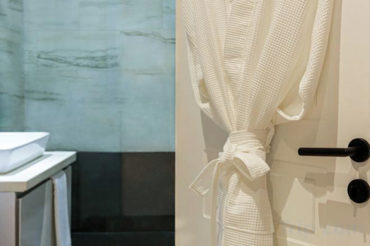 Bathroom | Shower, free toiletries, hair dryer, bathrobes