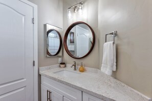 Combined shower/bathtub, hair dryer, towels, soap