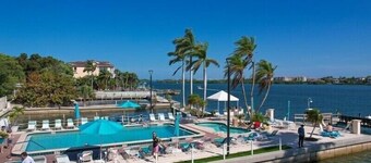 PALM BAY 5th floor ON THE BEACH 
Sunsets from the open lanai, Two Queen beds.