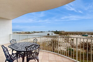 Outdoor dining - Stylish Condo with Furnished Balcony, Shared Pool, Hot Tub, & Fitness Center (Orange Beach)