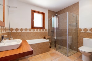 Bathtub, hair dryer, towels