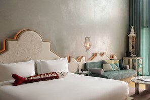 Premium bedding, down comforters, pillowtop beds, minibar