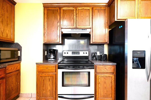 Fridge, microwave, oven, stovetop