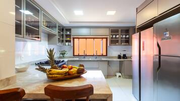 Fridge, microwave, stovetop, cookware/dishes/utensils