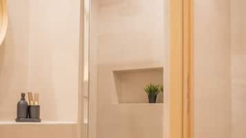 Combined shower/tub, hair dryer, towels, soap