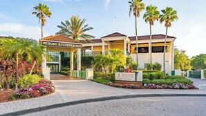 A resort registration building with a sign for Star Island Resort & Club Lobby & Reception. - Kissimmee | Family Park Trip | Pool & Sports Courts | 3BR Sleeps 8 (Kissimmee)