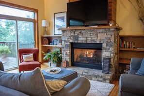 Smart TV, fireplace, DVD player, foosball