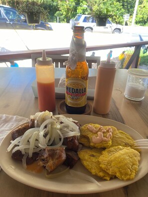 Outdoor dining - Relax Beach Front Apartment, near El Yunque (Riogrande)