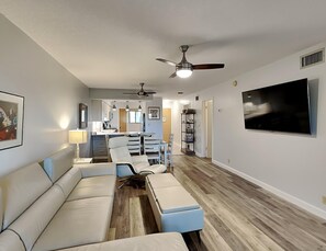 Condo, Multiple Beds, Garden View (#103-B - No Pets) | Living area | TV - Hibiscus by Distinctive Beach Rentals (St. Augustine)