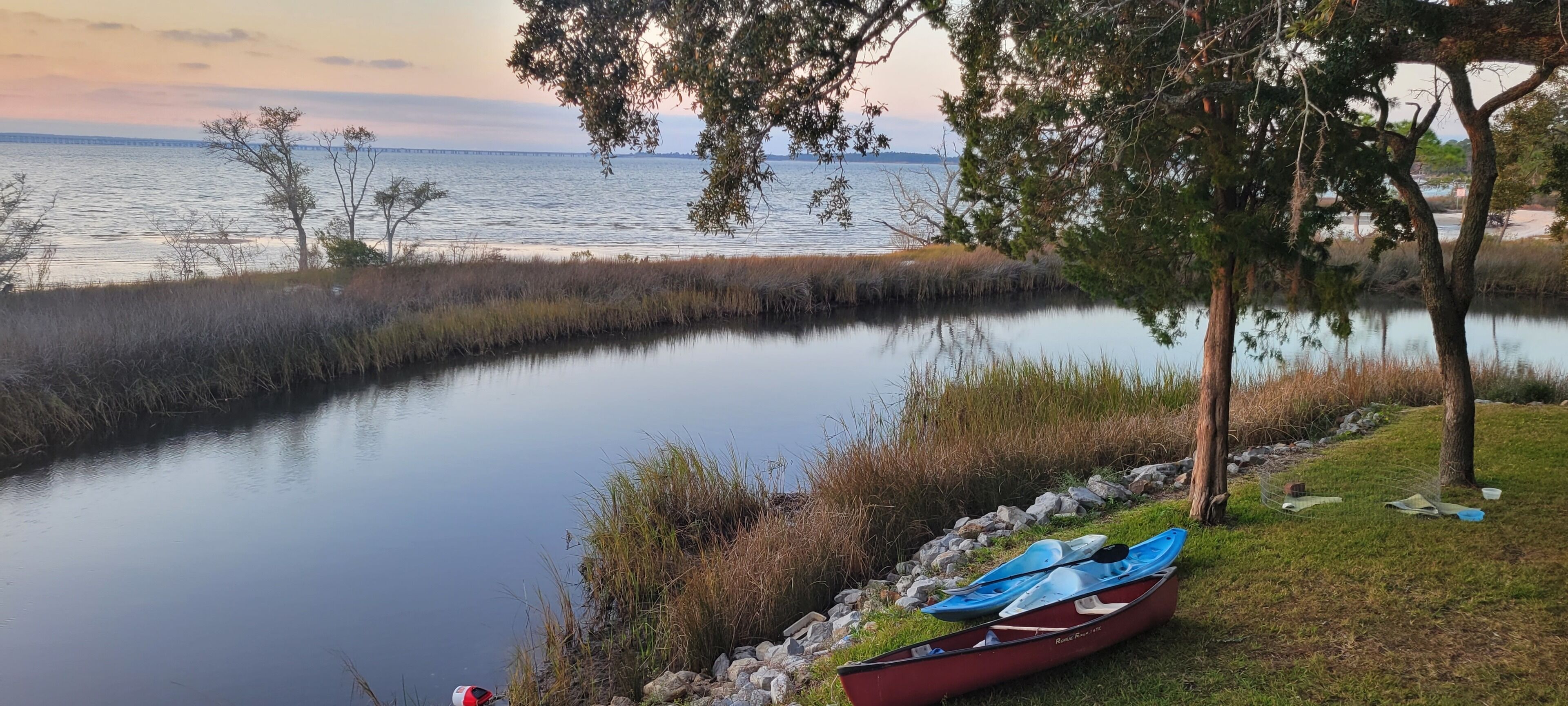 Waterfront on Pensacola Bay! 1 private fenced Acre directly on the water! 


